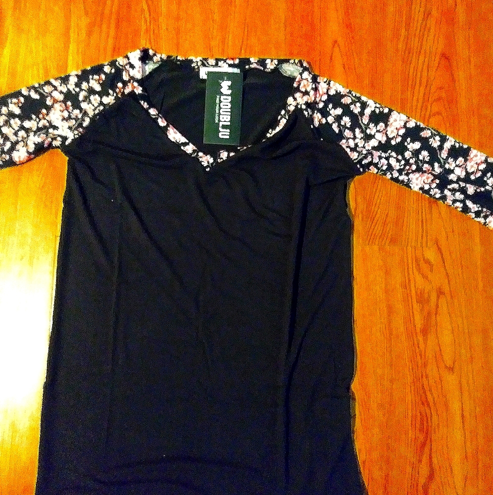 Top with floral sleeves